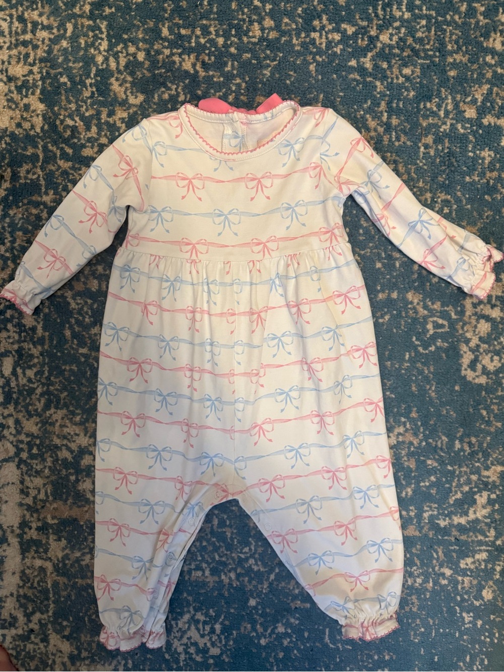 Infant White One-Piece with Pink & Blue Bow Pattern